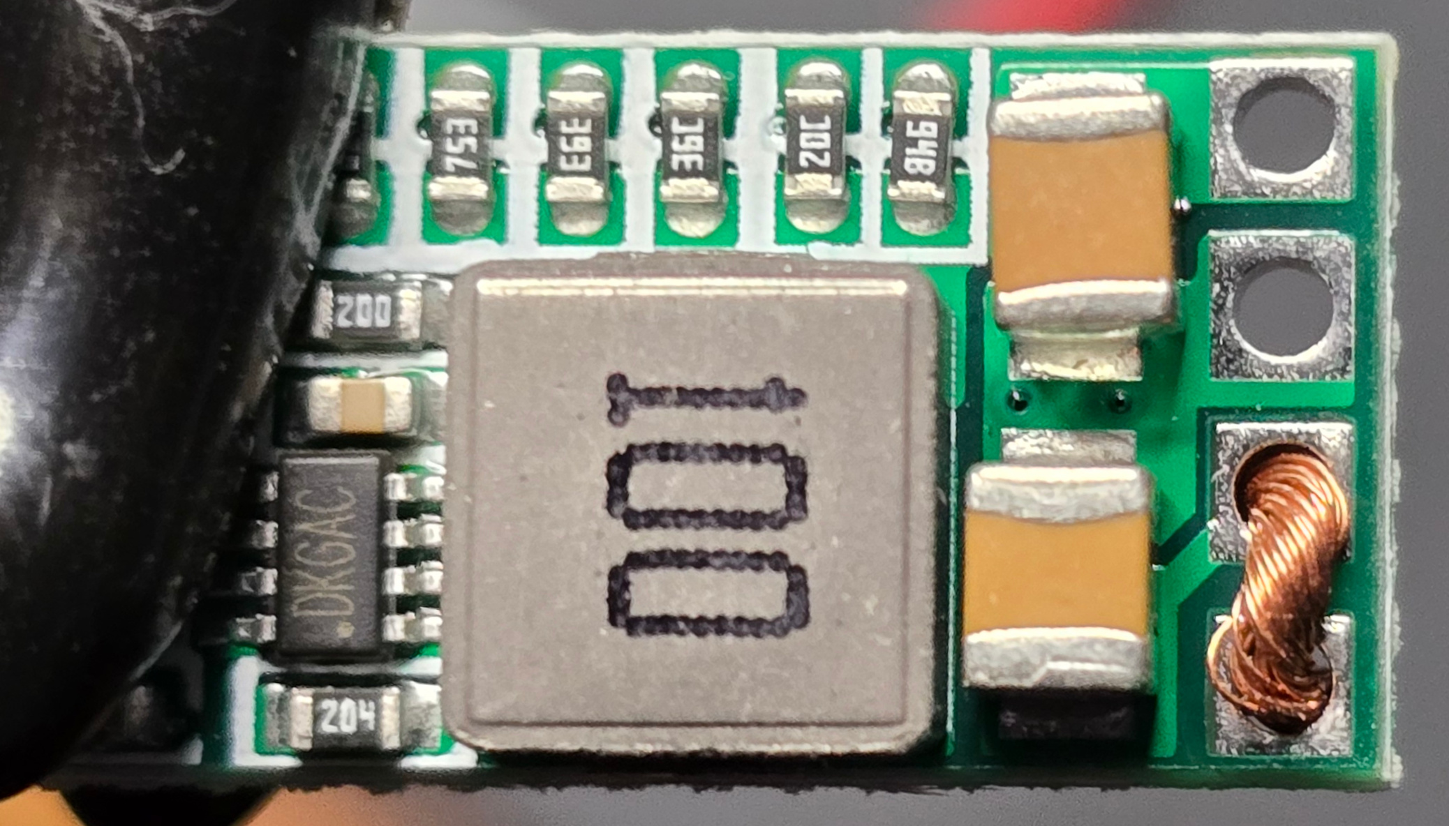 Top view of positive wire inserted into board Top view of positive wire placement
